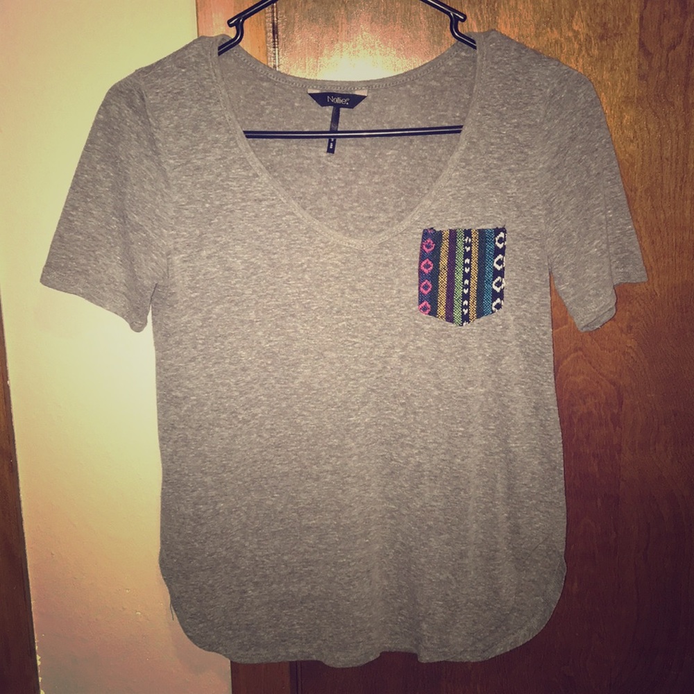 Nollie Brand gray V-neck with tribal stitch pocket